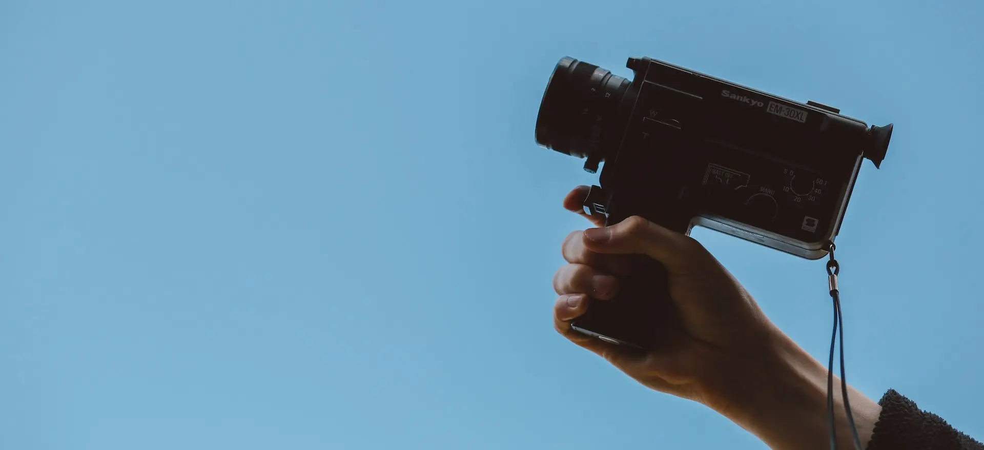 person holding video camera